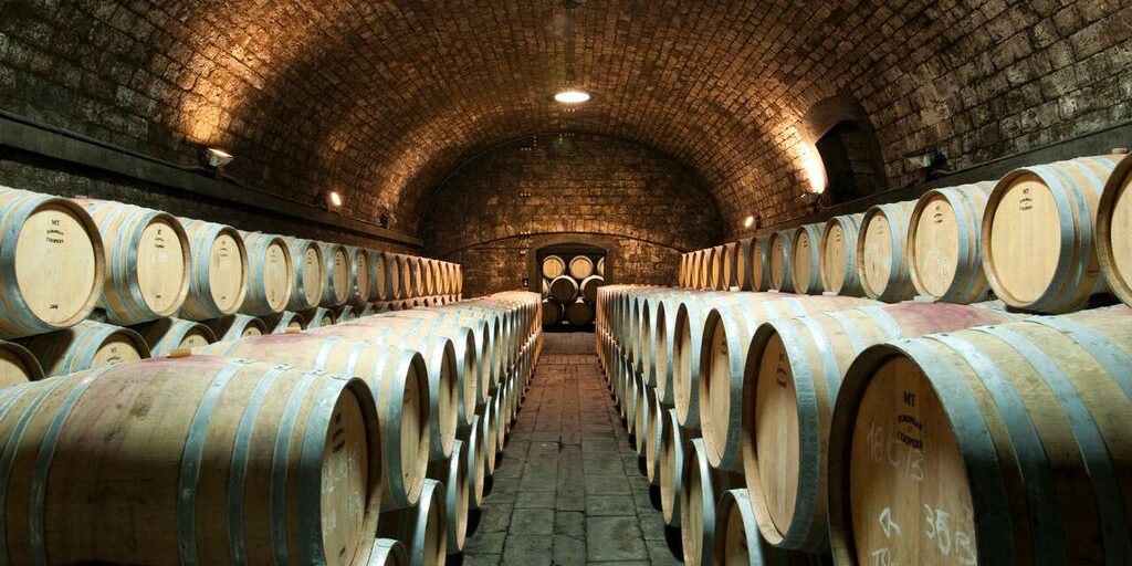 Antinori historical cellars under the Abbazia di Passignano, A former Benedictine order of Vallombrosa, was founded in 1049 by San Giovanni Gualberto and has the shape of a fortified monastery.